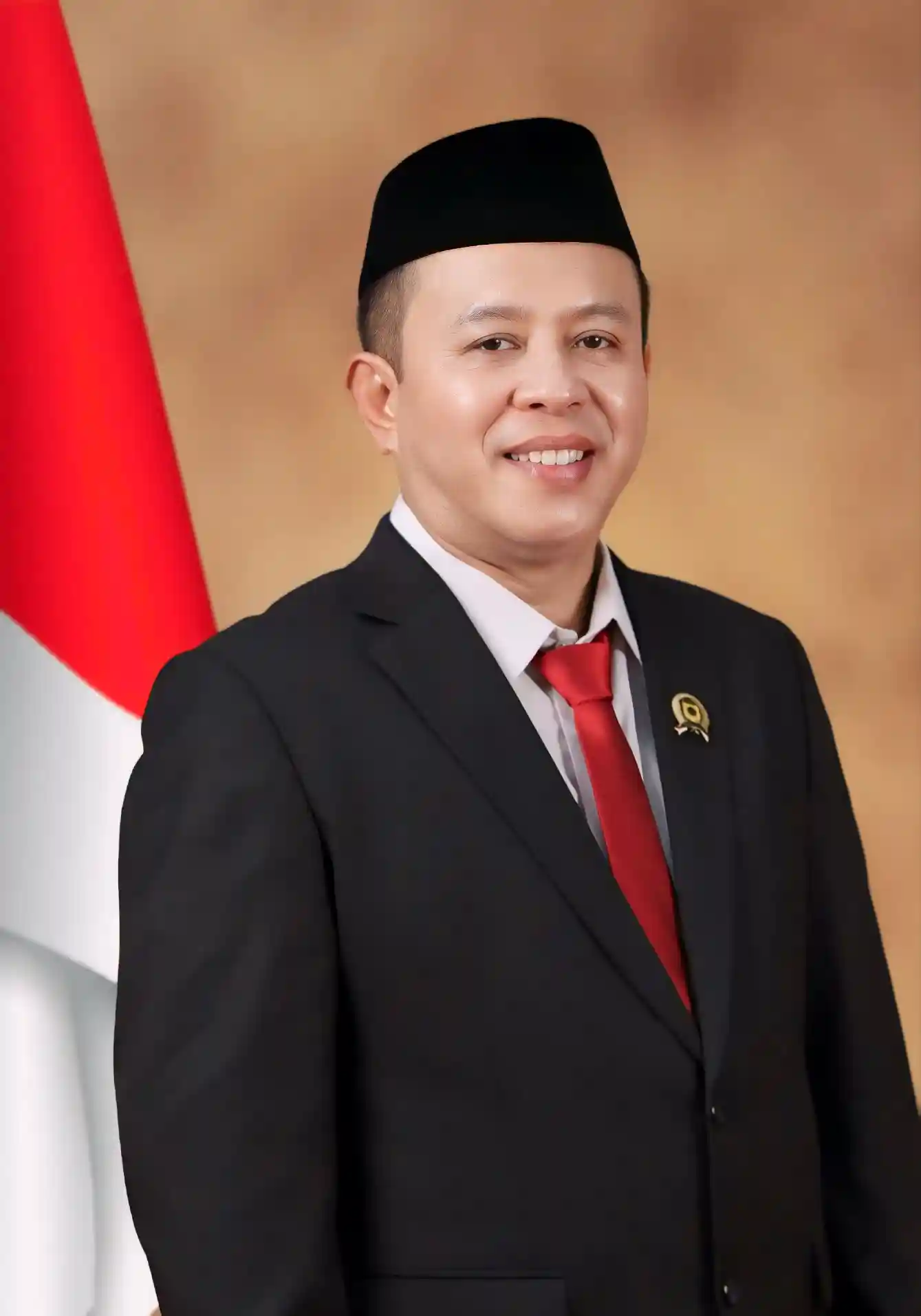 H. Ismail, S.IP., M.Si.